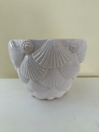 White Ceramic Planter With Layered Shell Motif And Glossy Finish