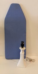 Tabletop Ironing Board And White Lamp