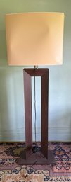 Mid-Century Modern Style Floor Lamp With A Wood Frame And Cream Shade
