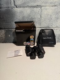 Vintage Tasco Binoculars Featuring A Charles Schwab Branding On The Carrying Case.