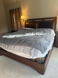 Contemporary Lexington Furniture King Dark Wood And Leather Panel Bed.