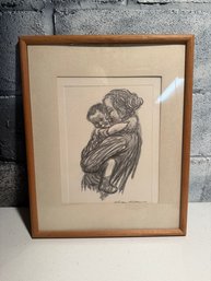 Framed Print By Kathe Kollwitz Depicting A Mother Holding A Child.