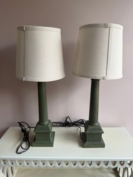 Pair Of Green Painted Column Table Lamps With Linen Shades.
