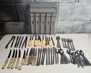 Mix Of Flatware And Knives
