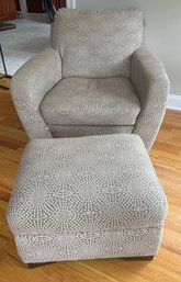 Modern Upholstered Armchair And Ottoman Set With A Geometric Pattern