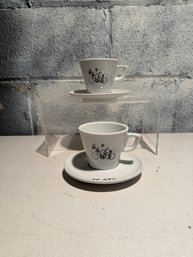 Set Of Two Modern Ceramic Espresso Cups And Saucers With Bicycle Design