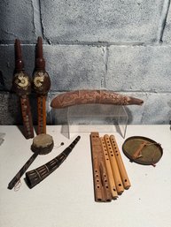Collection Of Artisan Musical Instruments, Likely Handcrafted In The Andean Style