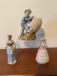 Collection Of Three Antique Japanese Porcelain Figurines, Including An Egg Carrier.
