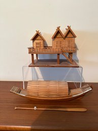 Wooden Model Of A Thai Stilt House And Longtail Boat With Oar