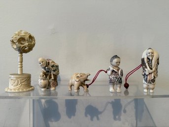 Collection Of Chinese Carved Figures And A Puzzle Ball.