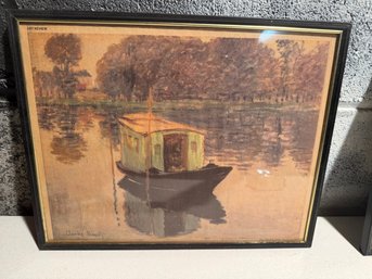 Framed Newspaper Print Of Claude Monet's 'The Studio Boat' Painting.