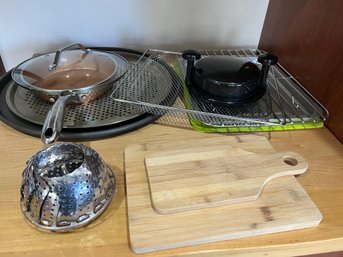 Assorted Kitchen Items  Baking Trays, Steamer, Cutting Boards, Cooper Skillet, Lid, And Chicken Shredder