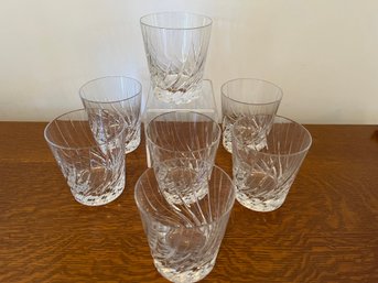 Seven Vintage Crystal Tumblers With Swirling Cut Patterns