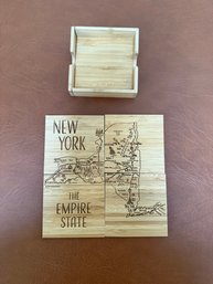 Set Of Four Bamboo Coasters With A New York State Map Design And Holder