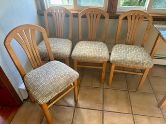 Set Of Four Modern Light Wood Dining Chairs With Geometric Upholstered Seats