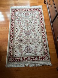 Hand-knotted Wool Area Rug With An Ivory Field/red Border In The Mughal Style.