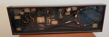 Curated Shadow Box Displaying The History Of Tennis Rackets And The Sport.