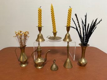 Collection Of Middle Eastern Brassware, Including Candlestick Holders, Pitcher, And Ewer.