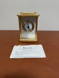 A Gold-toned Bulova Quartz Mantel Clock With Westminster & Whittington Chime