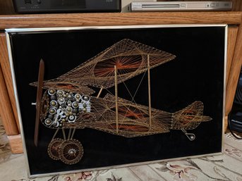 Framed Mid Century String Art Biplane With Mixed Media Elements On Black Velvet.