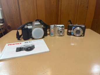 Panasonic Lumix DMC-LZ7, Nikon Coolpix 3200 And Pentax ZX-50 35mm SLR Film Camera