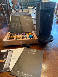DeLonghi Nespresso Vertuo Coffee Machine With Capsules And Manuals