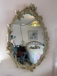 Carolina Mirror Company Ornate Oval Wall Mirror With A Distressed Cream Finish And Floral Motifs