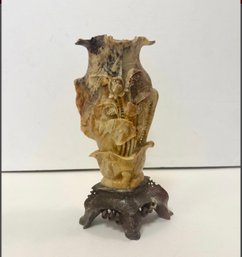 Chinese Carved Soapstone Vase With Floral Motifs On A Wooden Stand