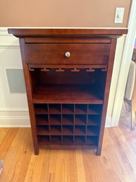 A Modern Wooden Wine Cabinet With Bottle Racks And Glass Hangers #1