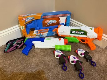 Several ZURU X-Shot And Nerf Super Soaker Water Blasters