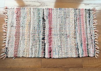 Colorful Hand-woven Cotton Rag Rug With Fringed Ends.