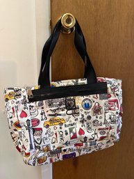 Brighton Fashionista Travel Tote Bag With A Whimsical City And Fashion Print