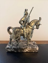 Metallic Decorative Figurine Of A Knight On Horseback On A Marble Base