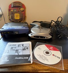 Iomega Predator CD-RW, Vu-me Micro Photo Keeper, And Linksys 2.4 GHz Speed Booster