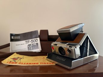 Vintage Polaroid SX-70 Land Camera With Chrome And Brown Leather Accents. With Case