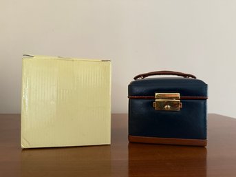 Dark Blue Leather Travel Jewelry Case With Brown Trim And Gold Hardware