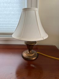 Vintage Brass Table Lamp With A Cream Lampshade.