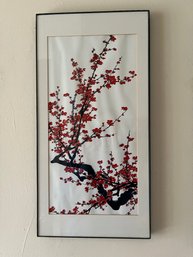 A Framed Ink Wash Painting Of Red Plum Blossoms On A White Background
