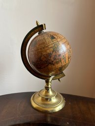Antique Terrestrial Globe With A Brass Base And Meridian Ring