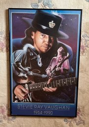 A Framed Memorial Poster Of Blues Guitarist Stevie Ray Vaughan
