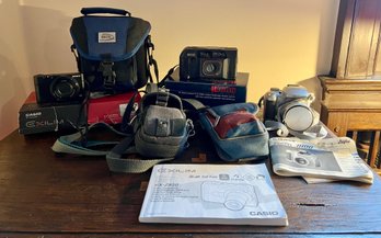 Fuji Film Fine Pix 3800 Digital Camera, Sony Cal Zeiss Digital Camera, And Ricoh TF-500 Camera