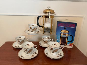 Pyrex French Press And Vintage Walbrzych Porcelain Teacup And Saucer Set Featuring A Floral Rose Pattern