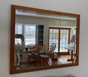 Large Rectangular Mirror With A Woven Rattan Like Frame.