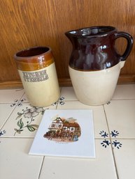 Kitchen Utensils' Holder, A Two-tone Brown And Cream Pitcher & Old Coach House York Trivet