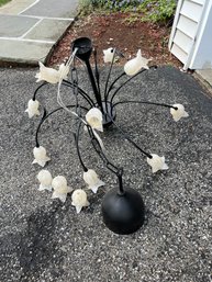 Contemporary Black Metal Chandelier With Floral Glass Shades.