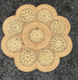 Hand-braided Natural Jute Rug With A Floral Sunburst Design