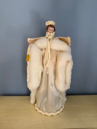 Decorative Angel Tree Toper With Porcelain Face And Faux Fur Trim.