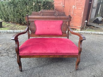 Antique Carved Mahogany Settee With Red Upholstered Cushions