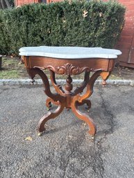Victorian Rococo Carved Walnut Marble-top Turtle Table.