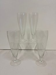 4 Clear Glass Pilsner Stemmed Glasses.